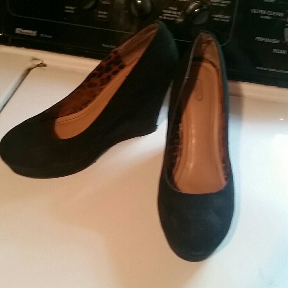 Slightly worn black heels